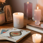 A peaceful tarot reading setup with a candle, journal, tarot cards, and a healing crystal, symbolizing emotional recovery and clarity after divorce.